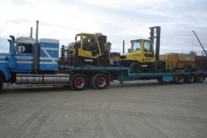 truck transporting bobcats